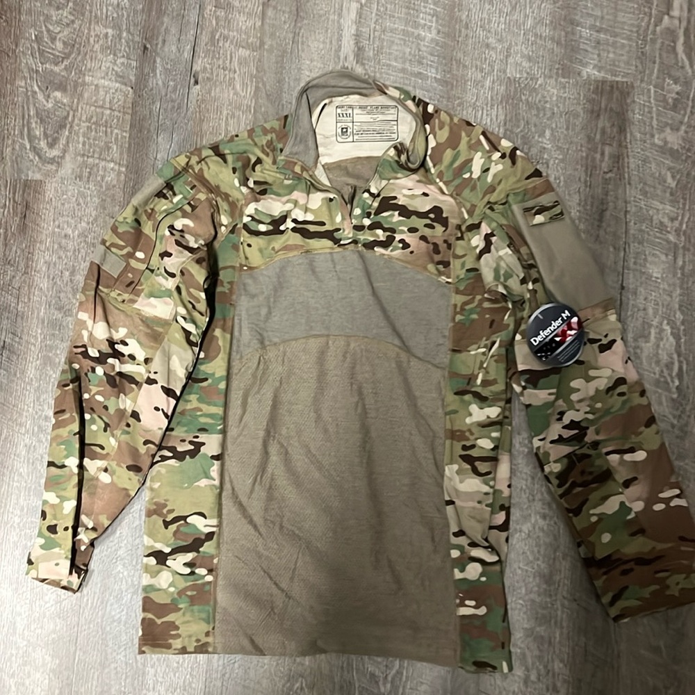Tactical/Combat shirt, size XXXL, fits similar to an XL.